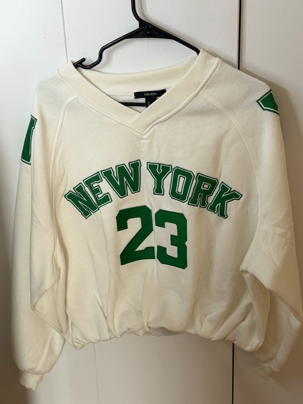 Ardene Cream V-Neck Pullover with Green 'New York 23'